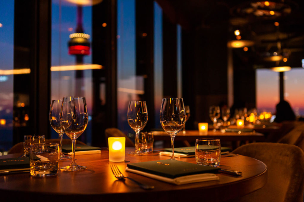 View of the newly renovated Canoe dining room during sunset.